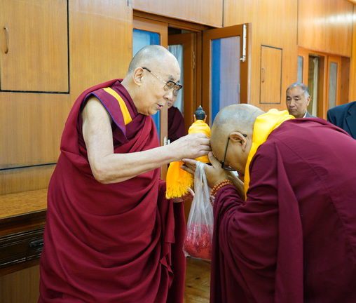 Dalai Lama blesses Geshe la Phelgye with Buddha Statue